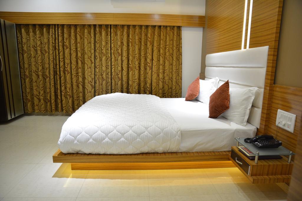 Hotel Corona Bharuch Pokoj fotografie