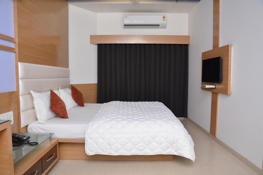 Hotel Corona Bharuch Pokoj fotografie